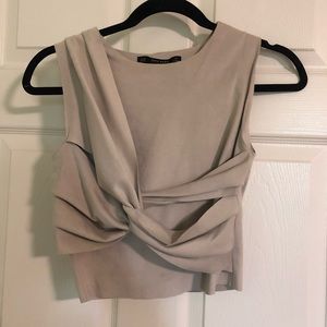 nude crop top with twist detail